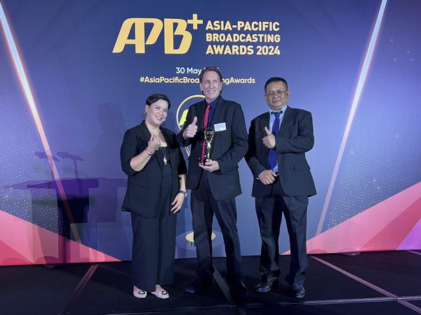 CBS Cambodia team on stage at APB+